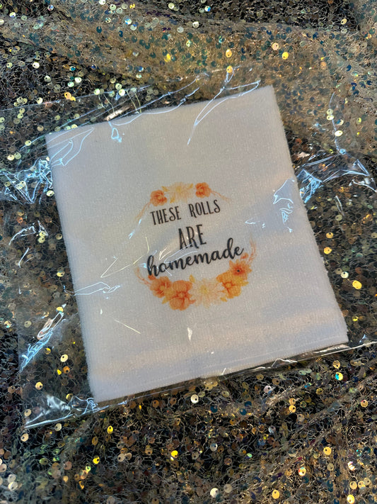 These rolls are homemade. Tea towel.