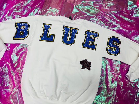 M blues sweatshirt.
