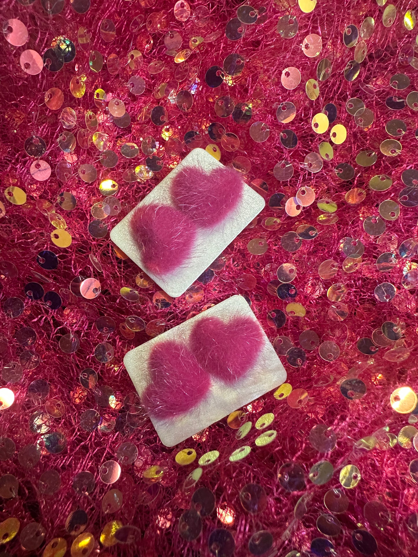 Pink fuzzy stud earrings