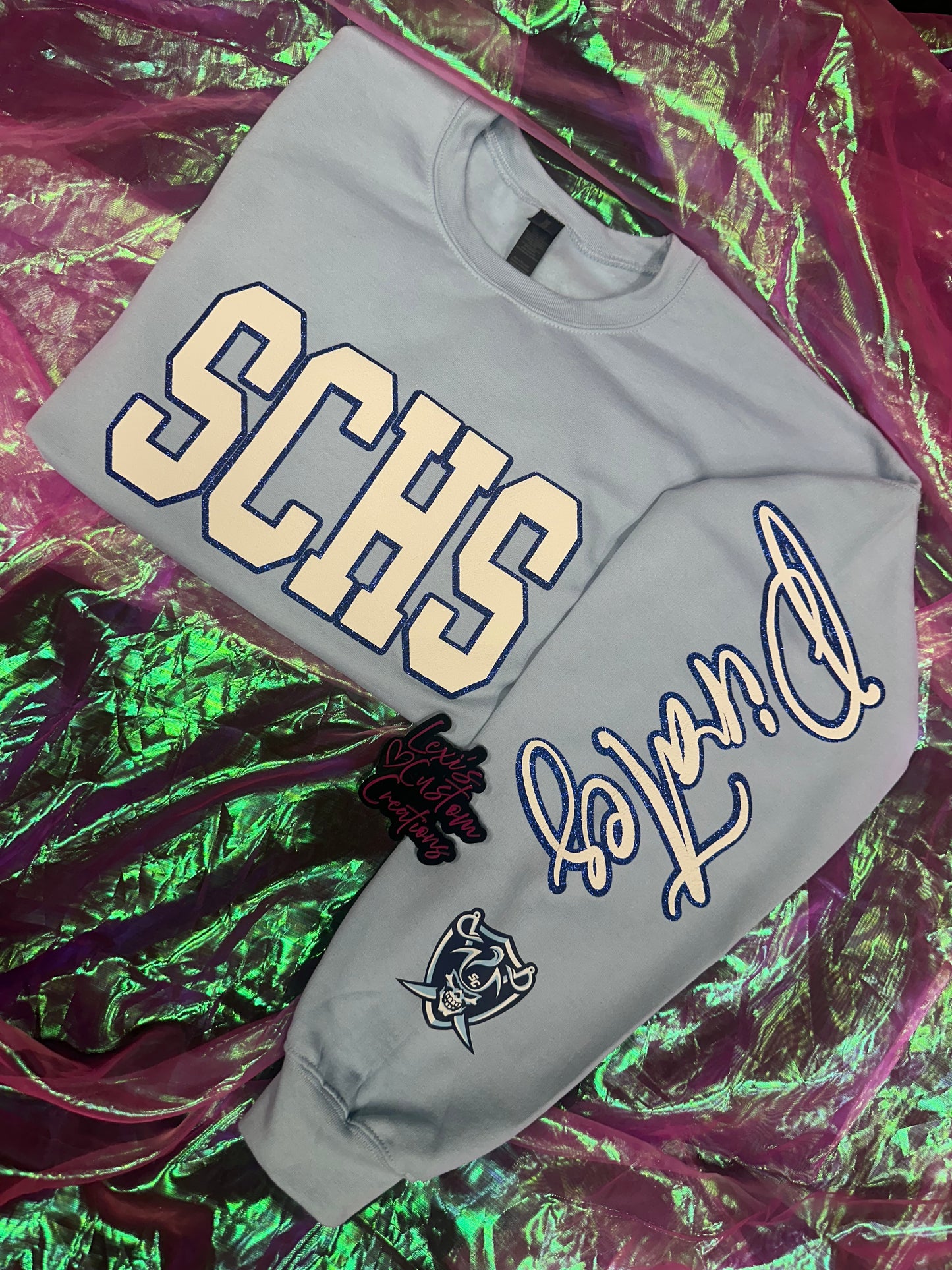 Custom sports team sweatshirts *Put size, colors and name of school in comments* Price includes ONE sleeve and front design, if wanting more message me.