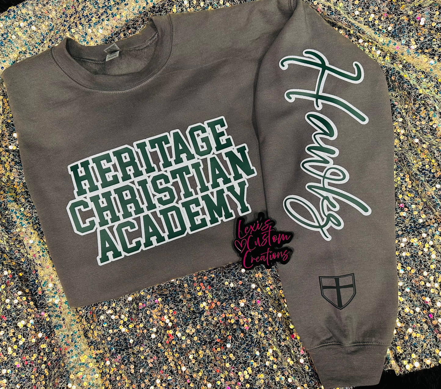 Custom sports team sweatshirts *Put size, colors and name of school in comments* Price includes ONE sleeve and front design, if wanting more message me.